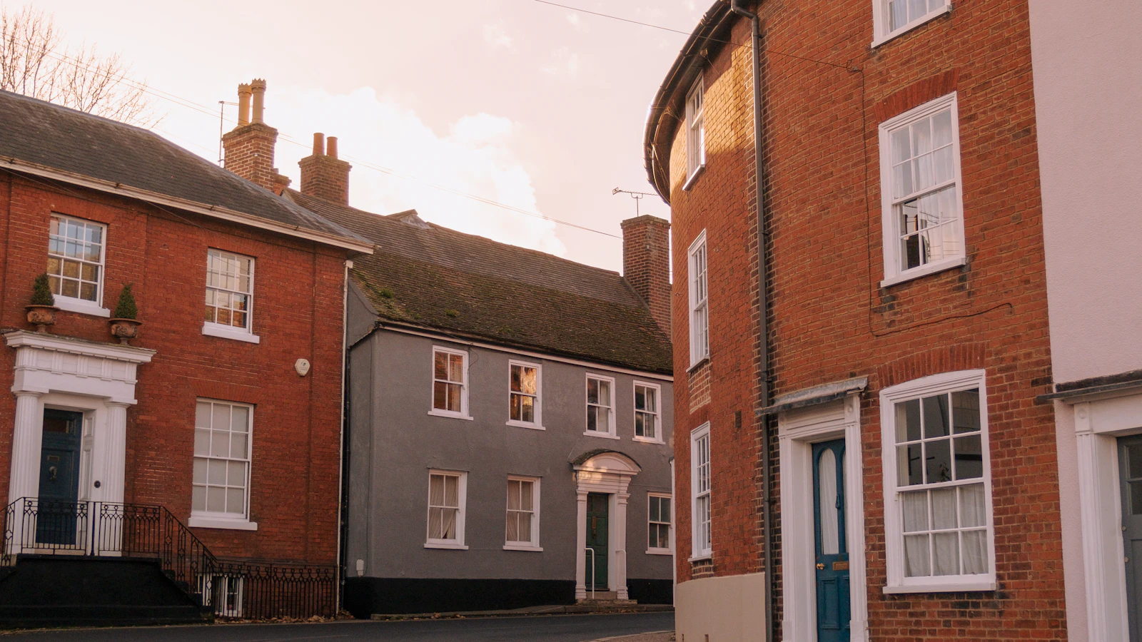 A street in a small English town with brick buildings